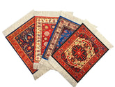 Wovenrugs Persian design coaster set with fringe protecting a wooden table