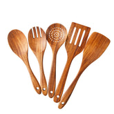 Yhendelion strainer spoon in teak finish for easy draining and quick cleanup.
