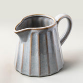 YHOJOY ceramic creamer pitcher 17oz with handle for milk and cream pours smoothly.