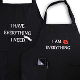 YIKA waterproof black couple apron protects outfits during cooking.