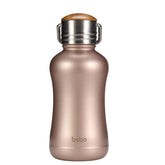YOHKOH mini insulated bottle with bamboo lid in gold, front view, sleek and compact.
