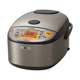 Zojirushi NP-HCC10XH control panel with orange LCD for precise timing and simple rice settings.