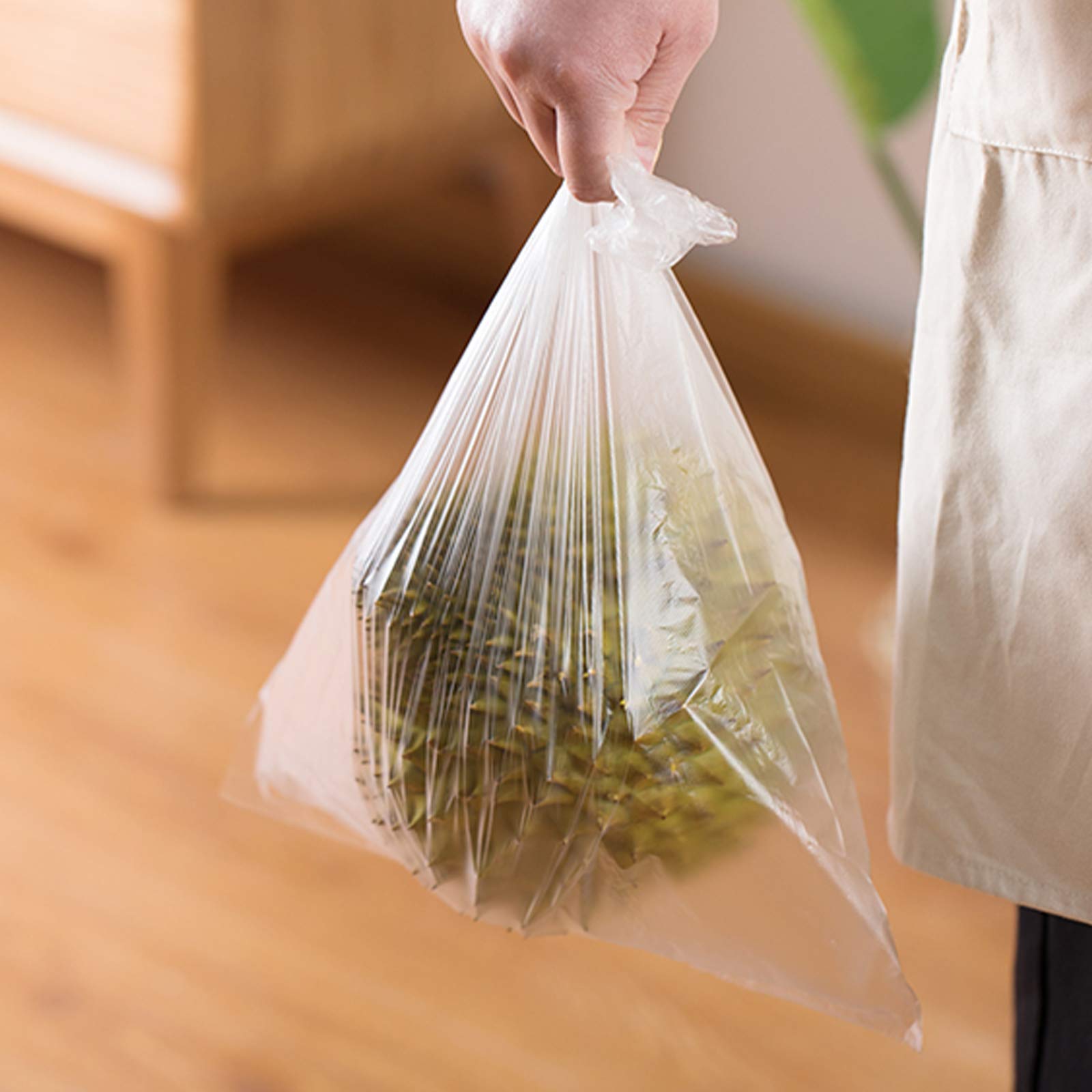 9527 Product 12x20 clear produce bag roll - ideal for organizing groceries.