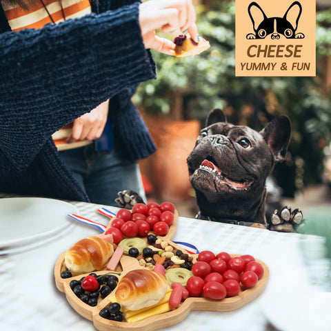 A AIFAMY 12-inch charcuterie board on table for festive snacking.