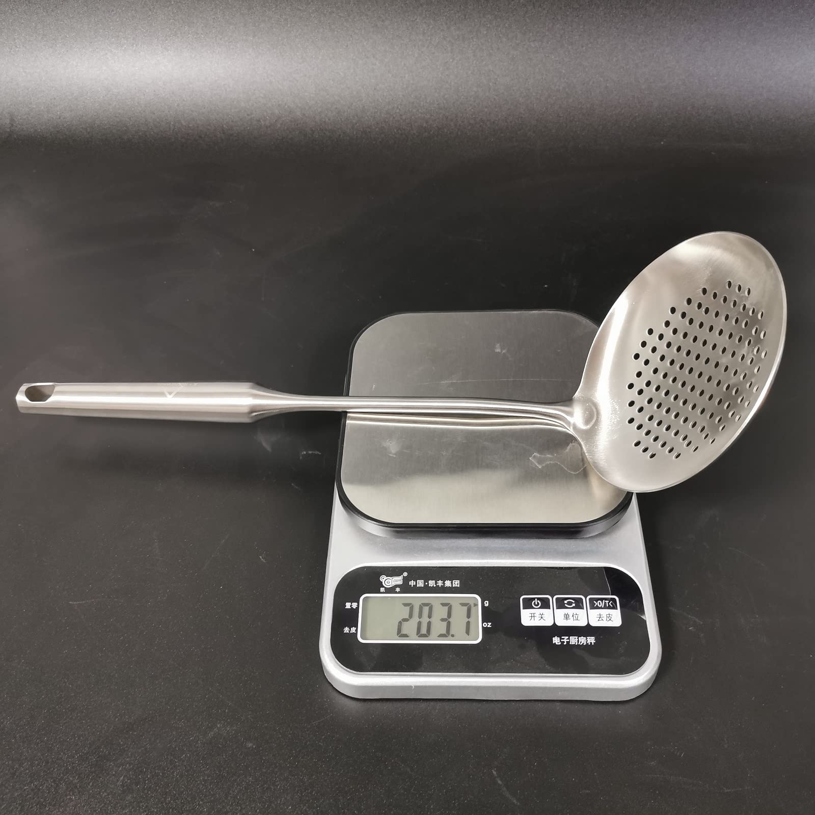 A · HOUSEWARE dishwasher-safe slotted spoon for quick cleanup after cooking