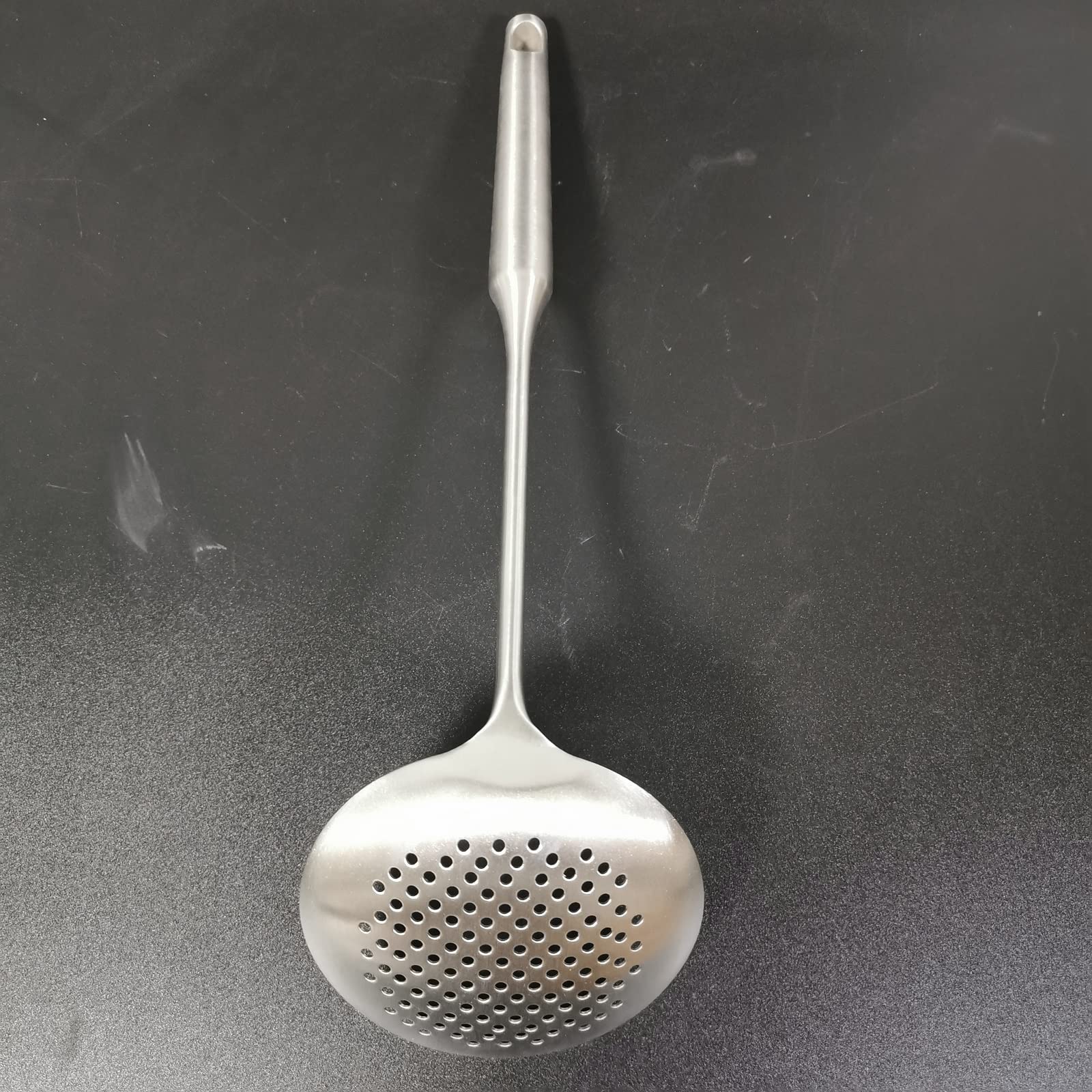 A · HOUSEWARE long-handle skimmer keeps hands away from steam