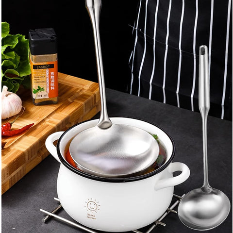 A · HOUSEWARE anti-scald handle ensures safe, comfortable serving of hot soups.