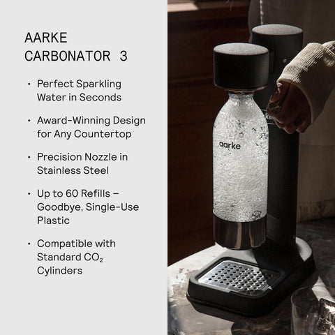 Aarke drip tray cover detail supports tidy, spill-free dispensing of sparkling water.