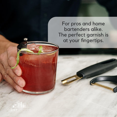 A Bar Above gold-plated blade glides through peels for ribbons and spirals.