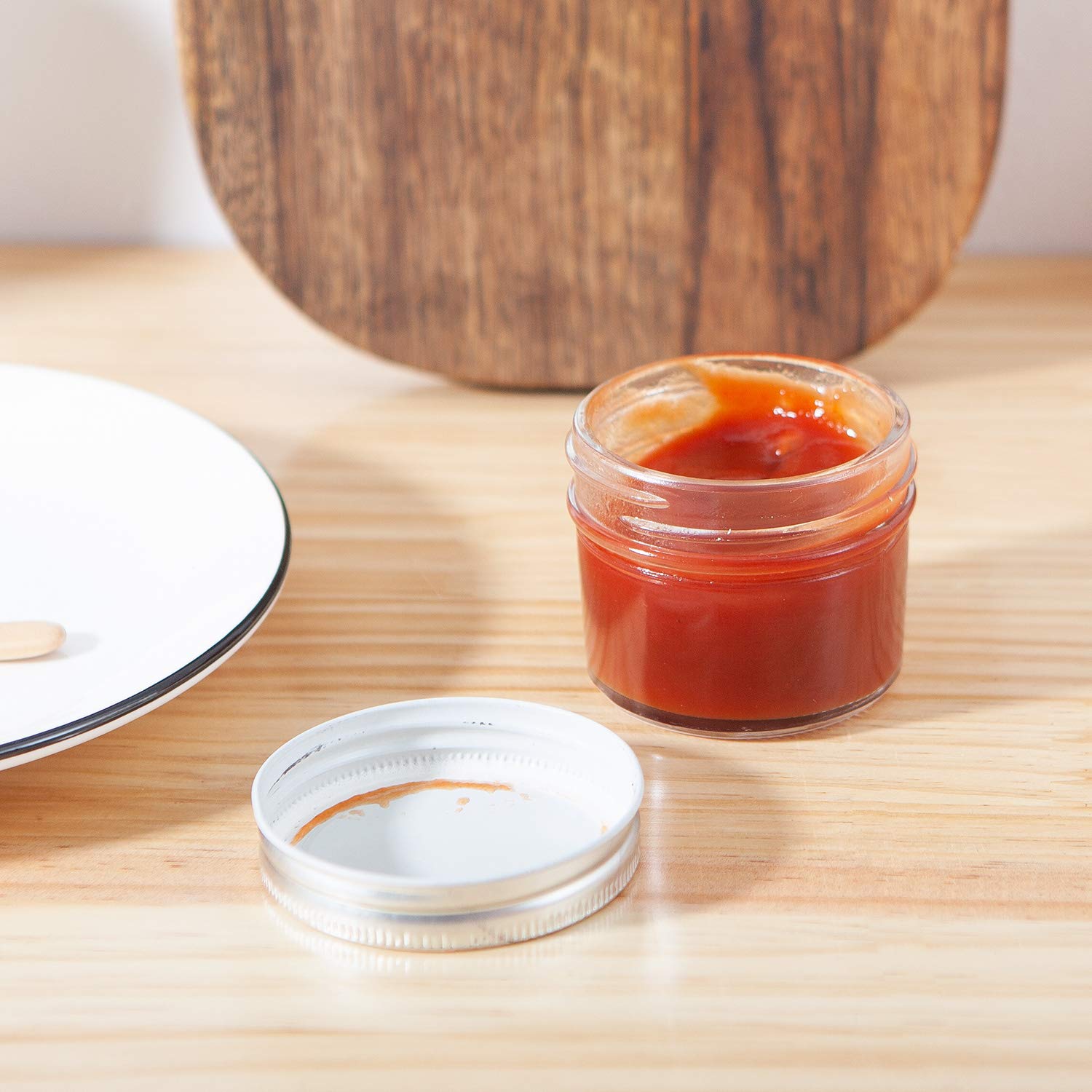 Accguan wedding favors and mini dessert displays with stylish jars.