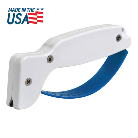 ACCUSHARP sharpener in use on a straight blade for quick sharpening.