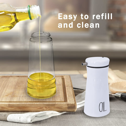 Aelga glass oil dispenser closeup shows clarity and quality.