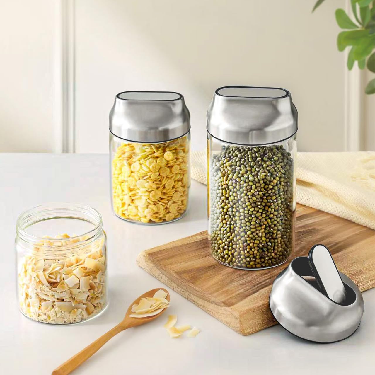 Aelga kitchen pantry organization with clear glass jars keeps ingredients in order.