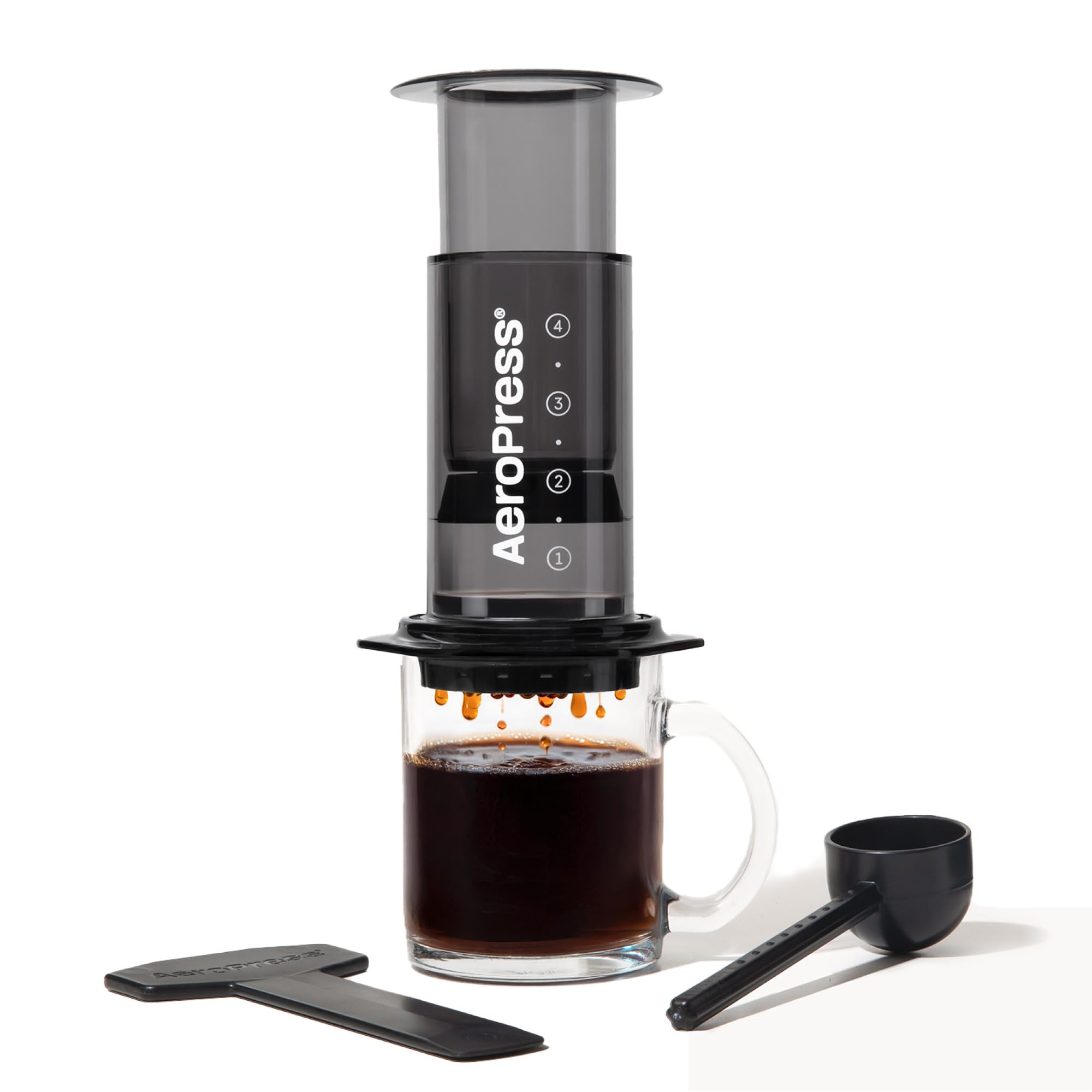 AeroPress Clear Black Coffee Press front view shows a portable, shatterproof brewer for on-the-go use.