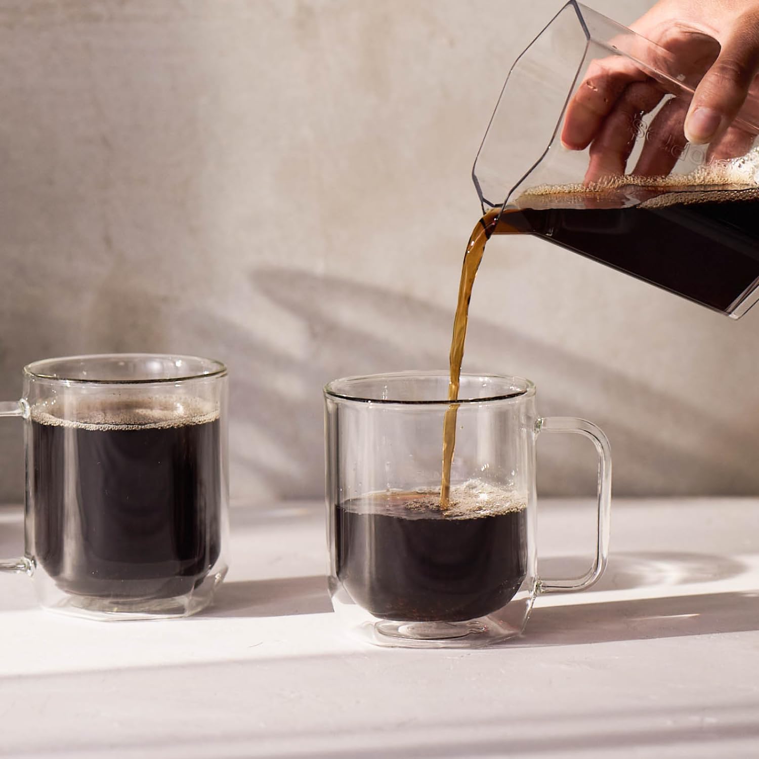 AeroPress coffee carafe travel-compact-spout enables neat, on-the-go brewing