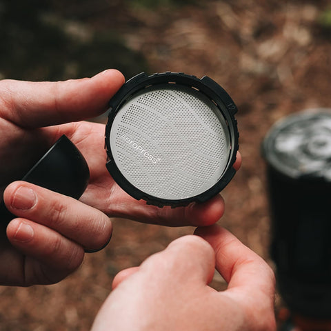 AeroPress reusable metal filter ready for rinse-and-use sessions.