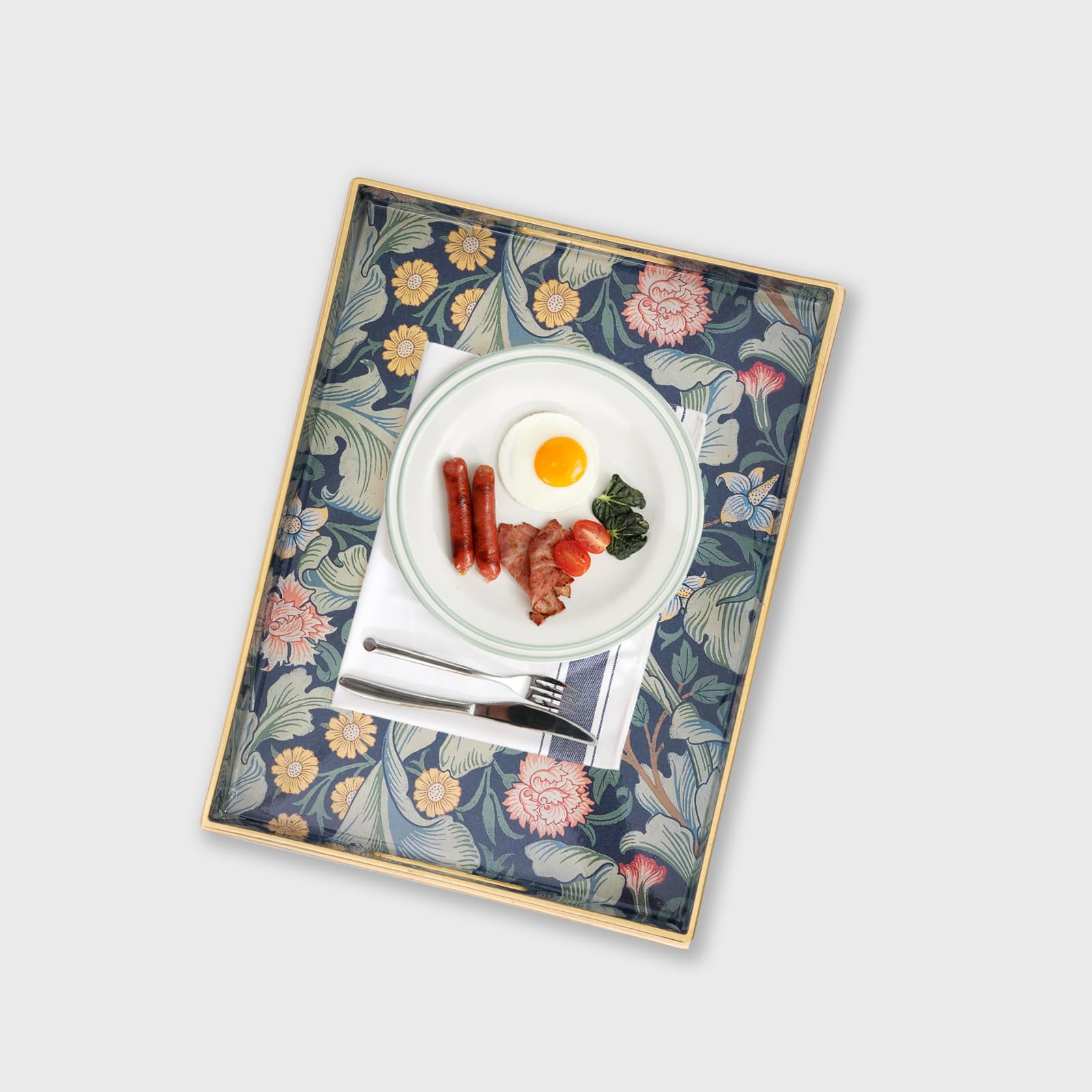 AGIOTA serving tray with handles on an ottoman boosts convenience and style