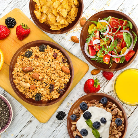AIDEA acacia bowls arranged for salad, showcasing easy serving for four.