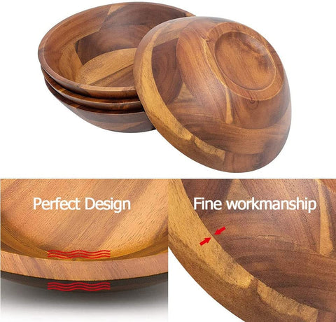 AIDEA acacia bowls under running water, illustrating easy cleaning.