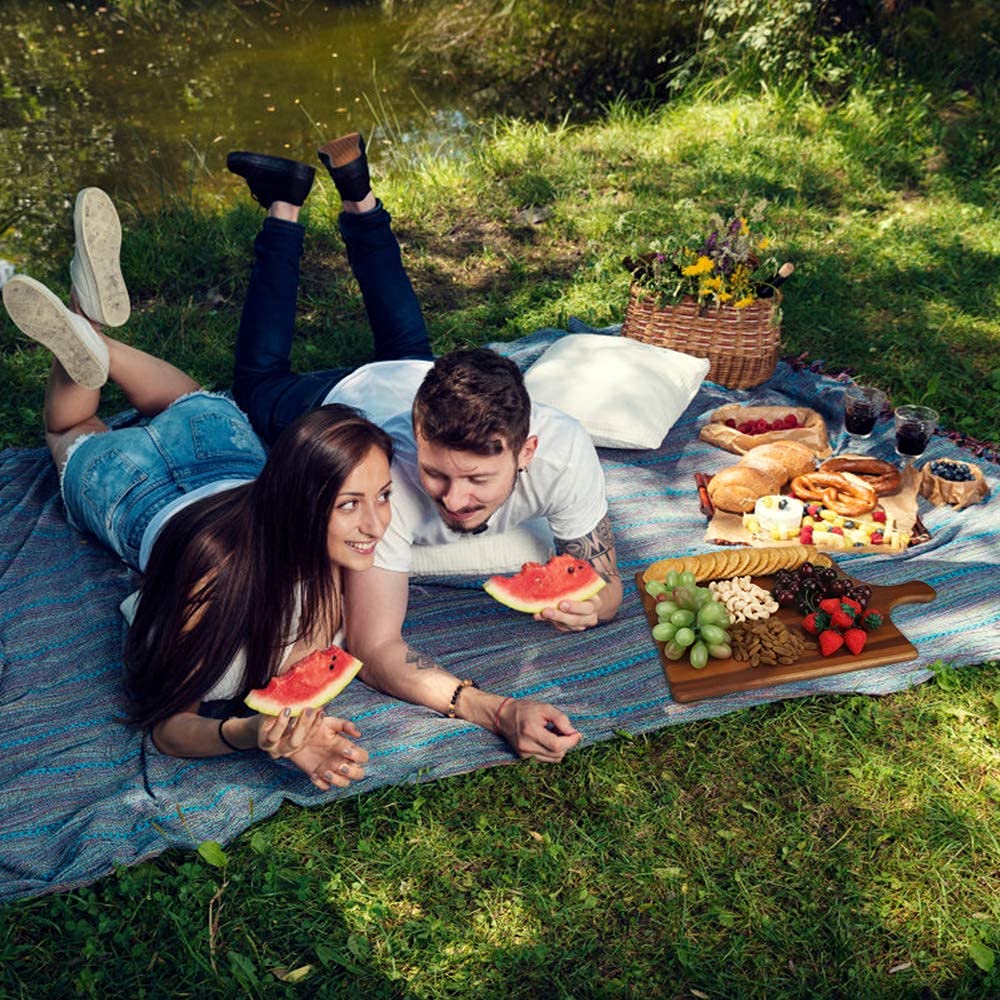 AIDEA charcuterie board with cheese, meat, crackers and fruit ready for sharing.
