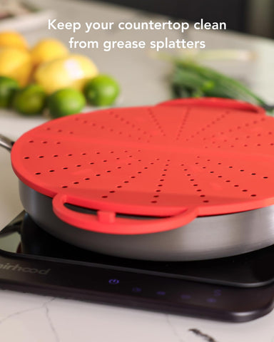 AirHood 2-in-1 splatter screen and trivet shields surfaces from heat.