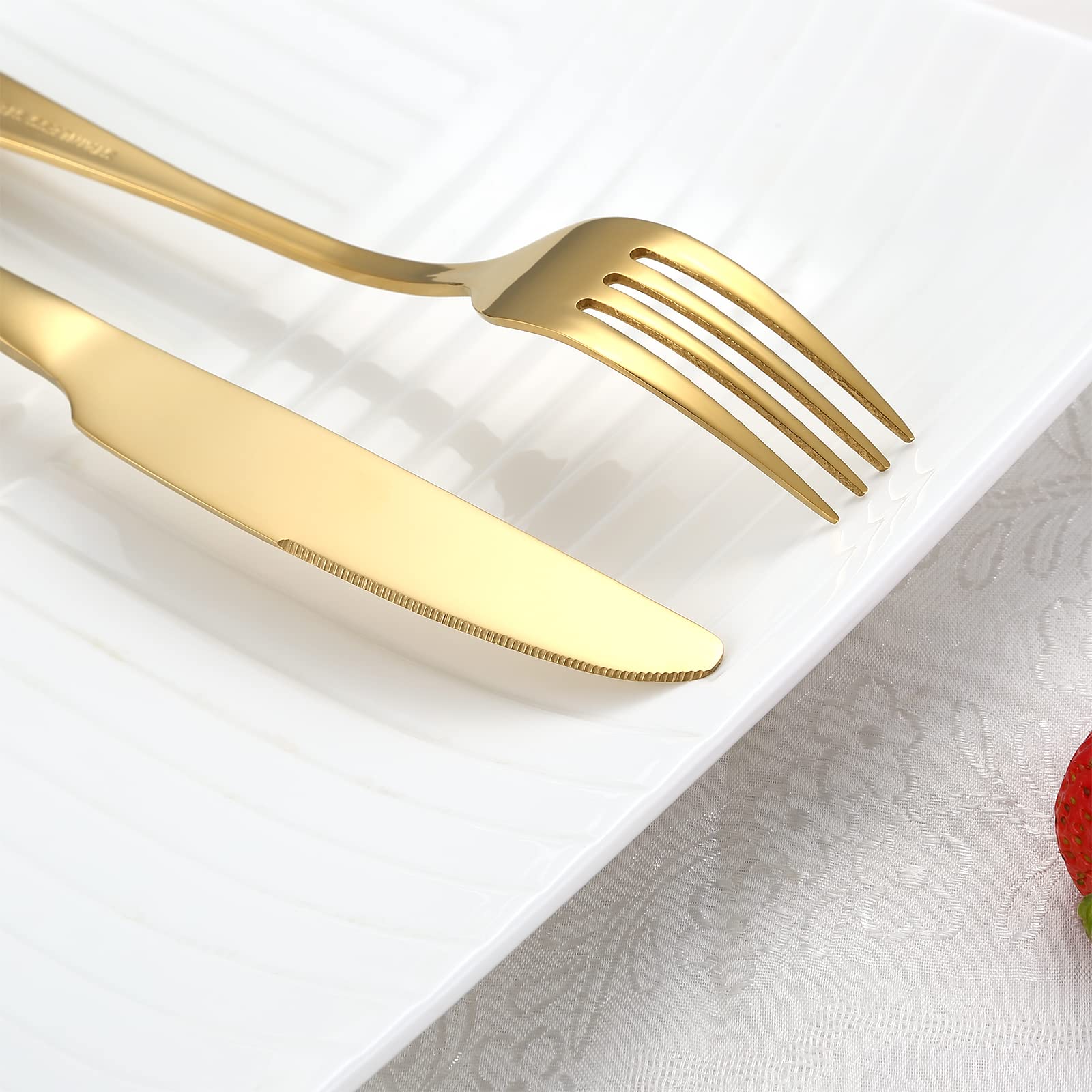 Aisoso gold salad fork pairs with plates for stylish, durable dining.