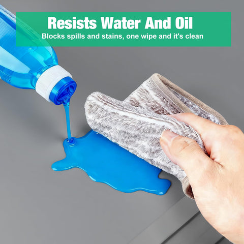 Aisslro under-sink mat raised-edge closeup demonstrates liquid containment.