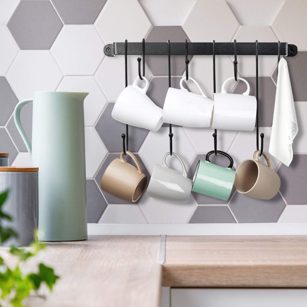 AJART black steel mug holder with a sleek design for stylish kitchen organization.