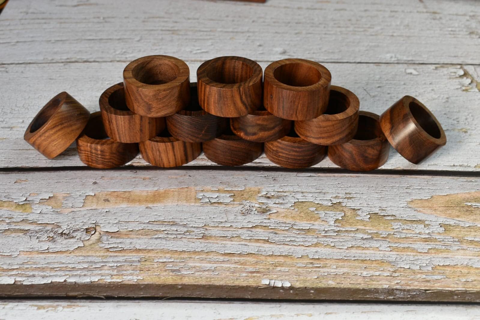 Ajuny napkin rings with smooth edges safe for delicate linens.