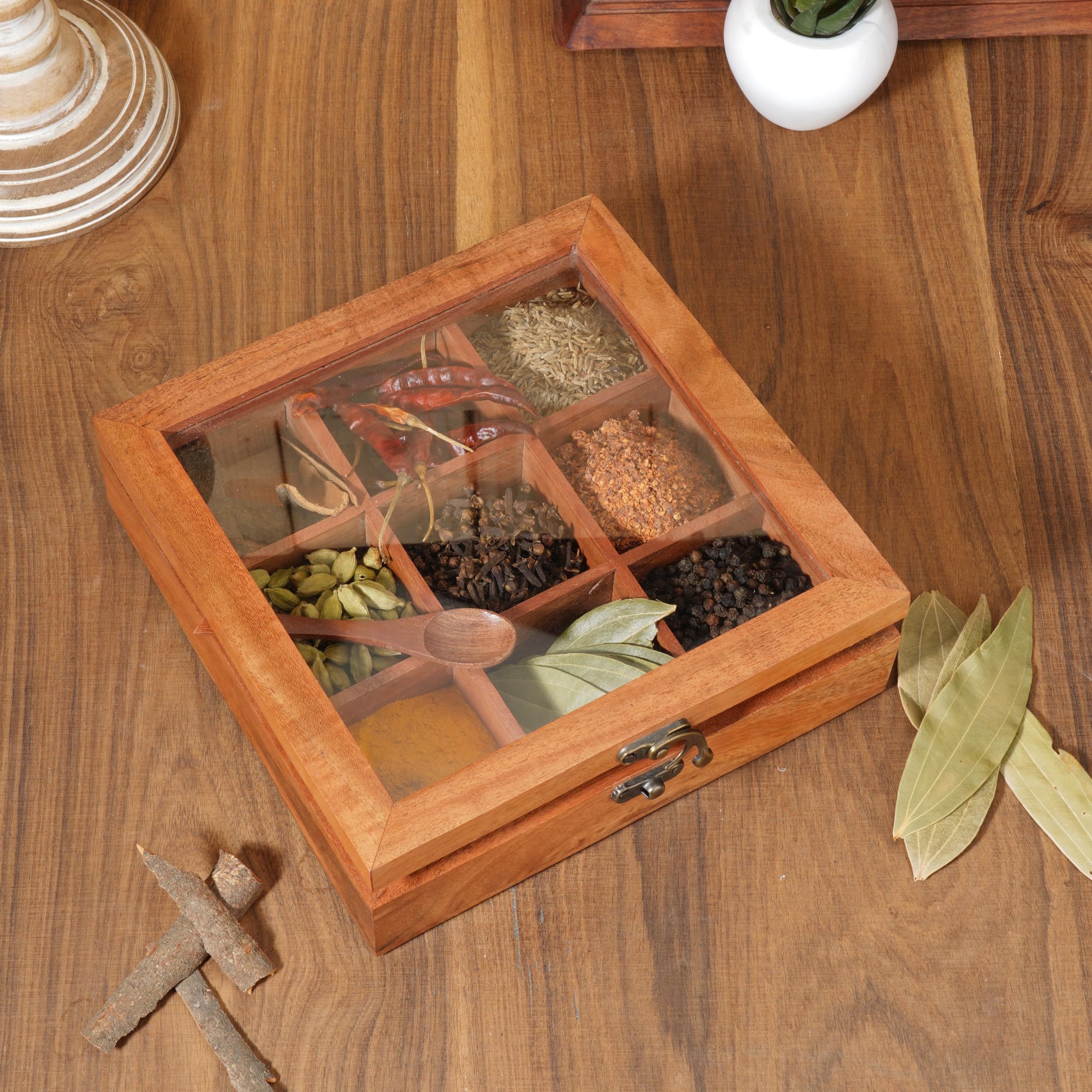 Ajuny spice box highlighting nine fixed compartments for organized storage