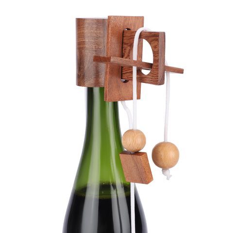 Ajuny wine puzzle on the dining table invites guests to solve.
