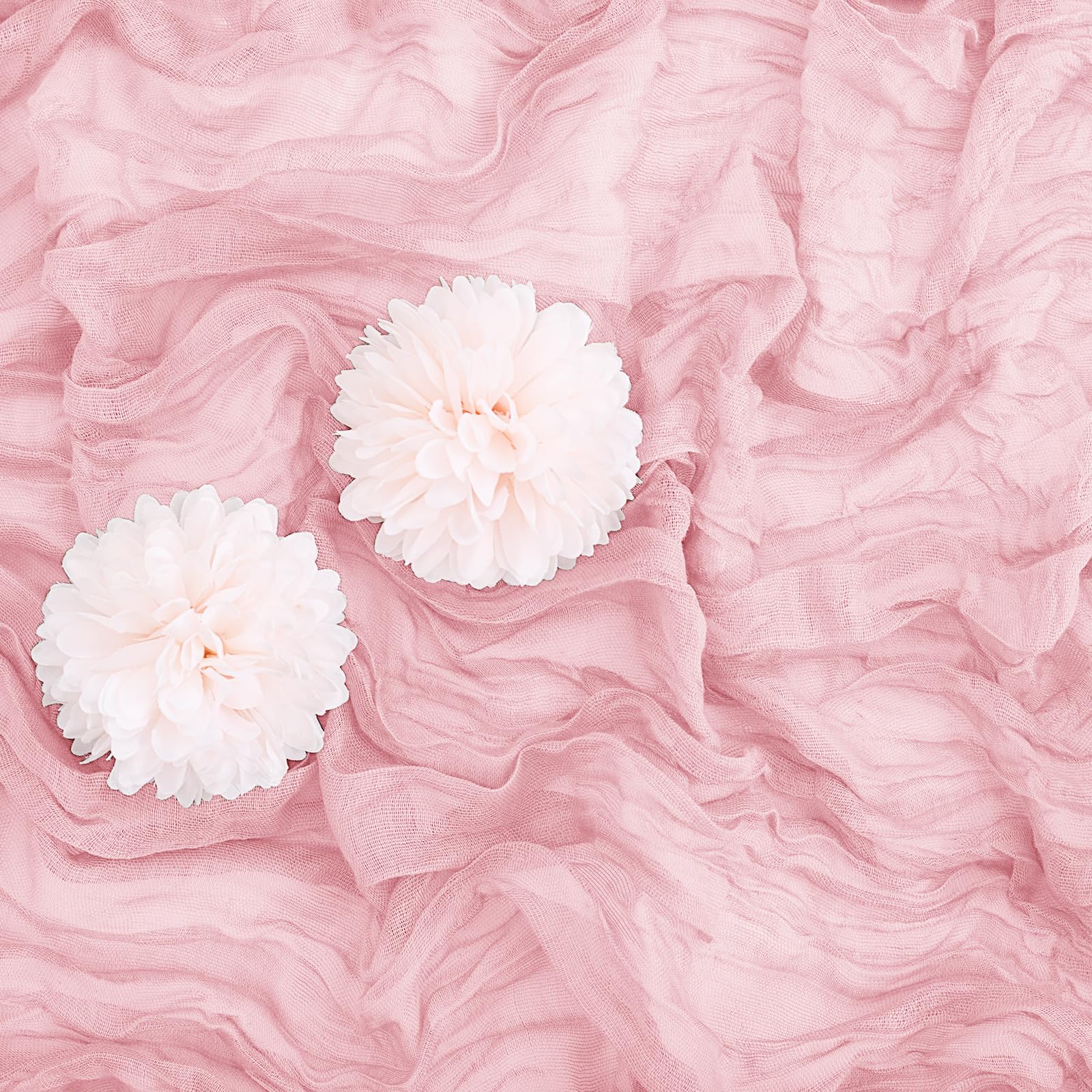 Aktor pink cheesecloth runner folded emphasizes soft texture and romantic event styling.