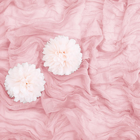 Aktor pink cheesecloth runner folded emphasizes soft texture and romantic event styling.