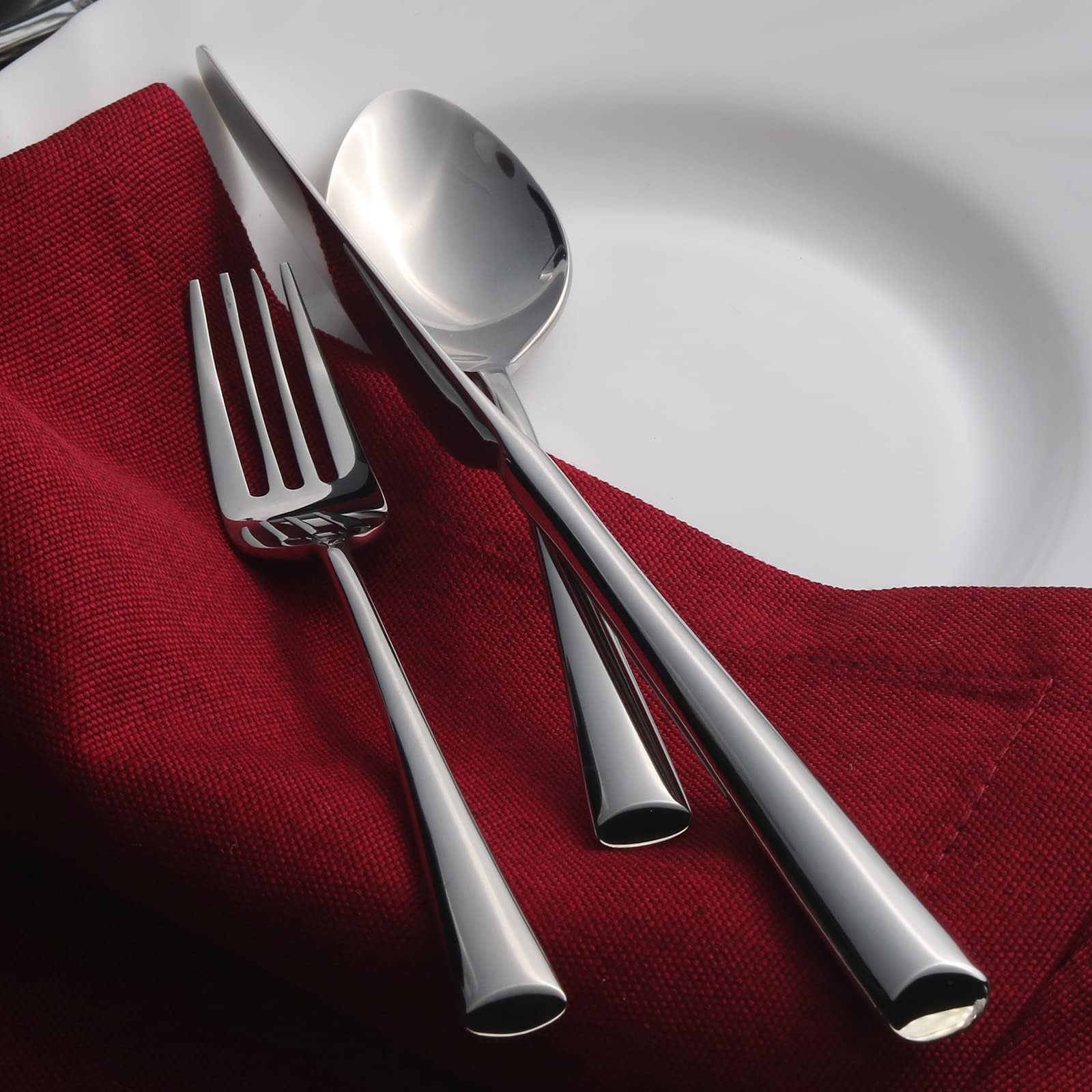 Alata Bailey mirror-polish finish on full set, elegant for entertaining.