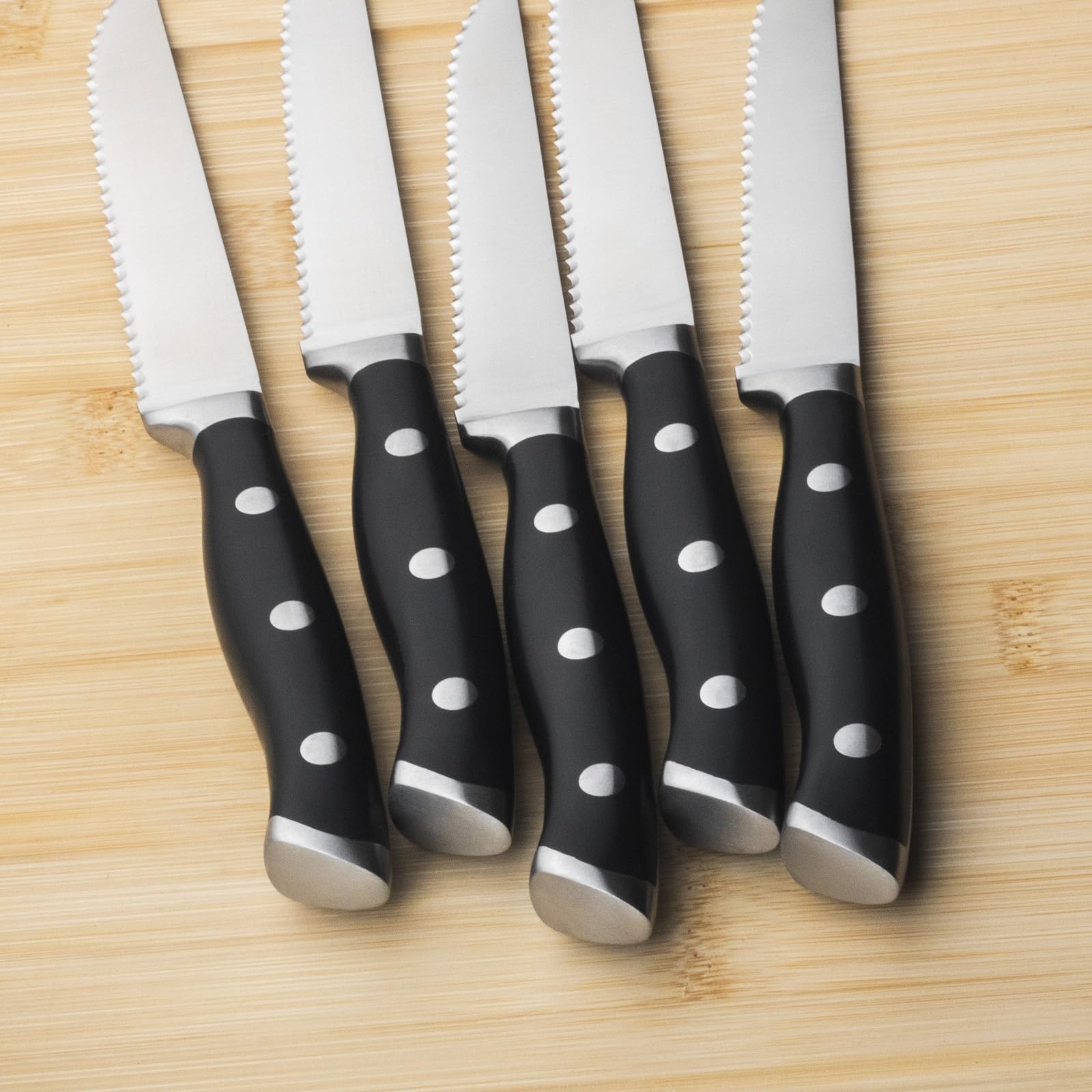 Alata steak knives full tang construction supports balanced control during every slice.