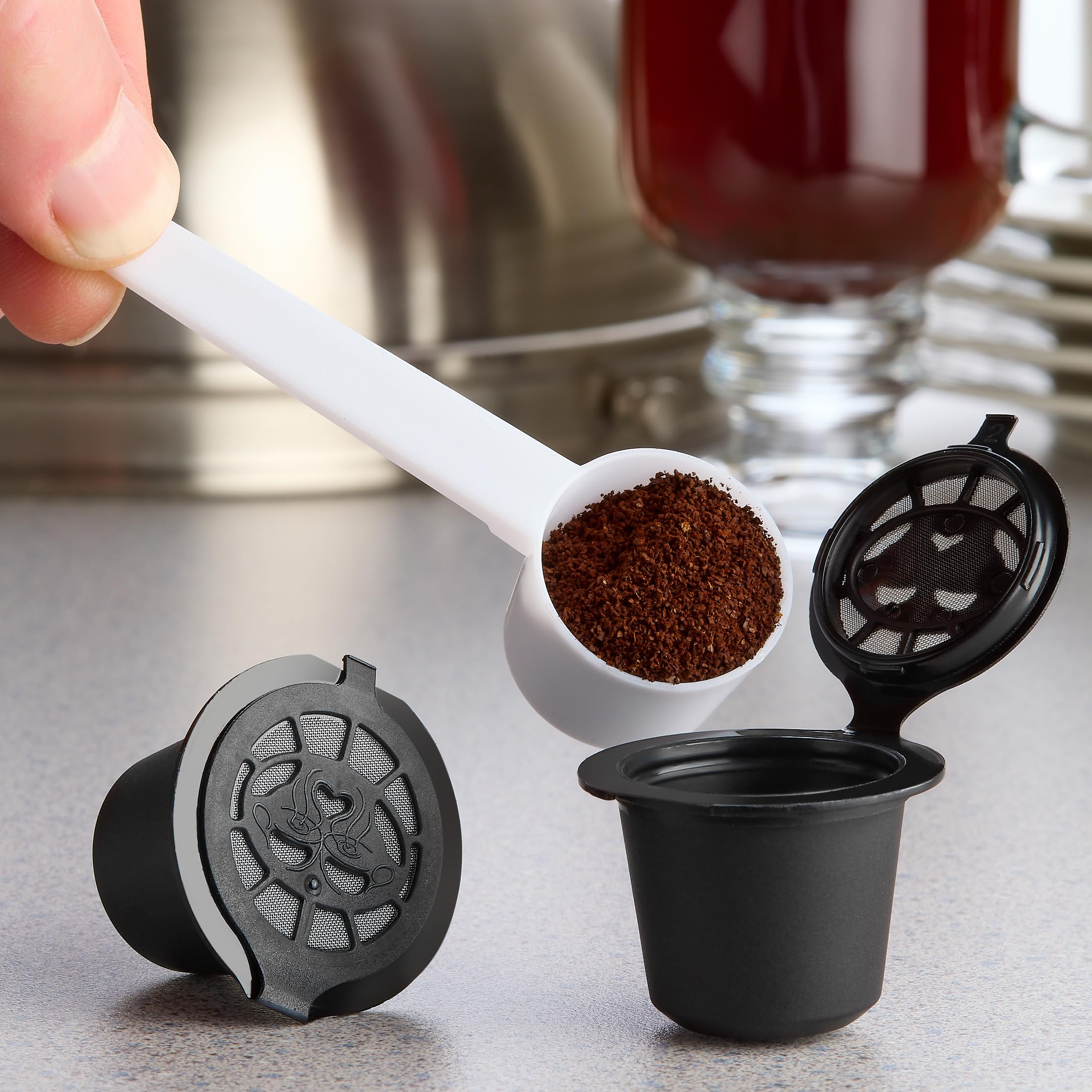 Alchemy Bar Goods included scoop demonstrates easy, precise 5–6 g espresso dosing.