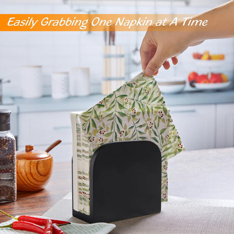 Alelion wooden tabletop napkin dispenser sits neatly on a dining table.