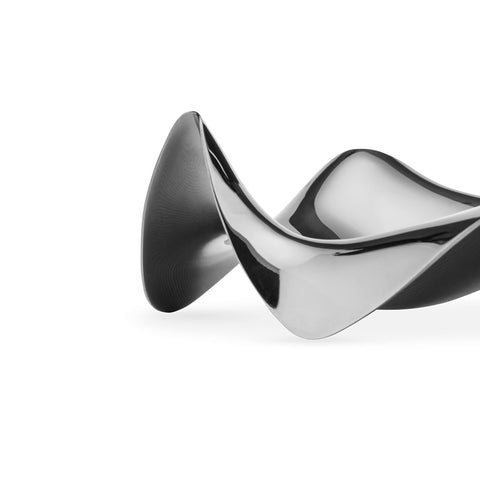 Alessi Blip PG02 resting beside a utensil rack to keep counters tidy