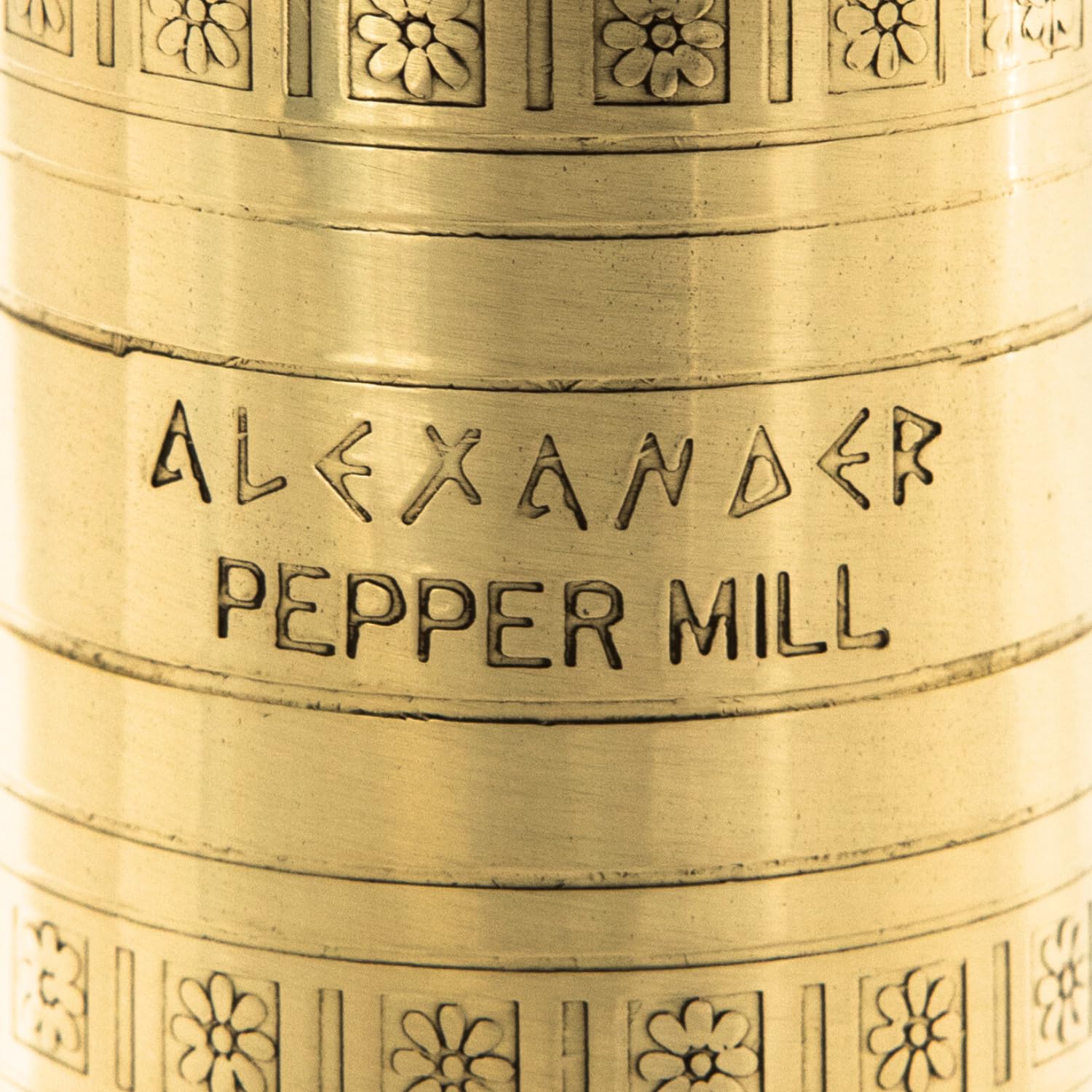 Alexander Home pepper mill with flanged base for stable grinding on any surface.
