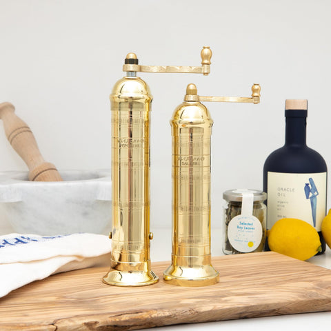 Alexander Home handmade brass pepper mill finish showing unique artisan character.