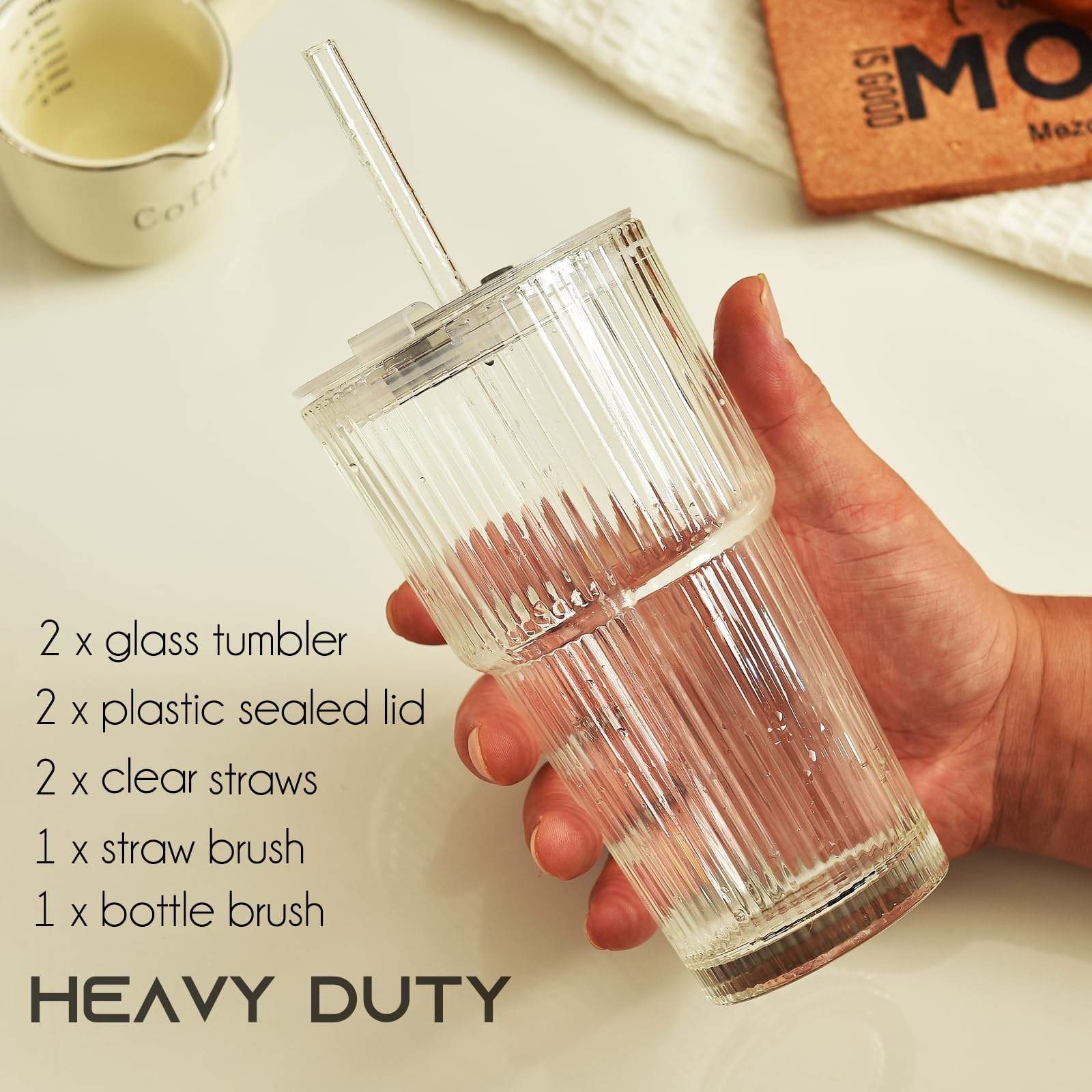 ALINK clear glass tumbler adds a sleek touch to beverages.