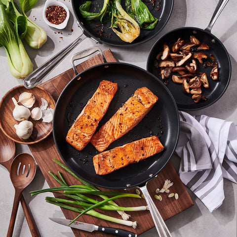 All-Clad 12-inch nonstick skillet 1034 close-up on sturdy stainless handle.