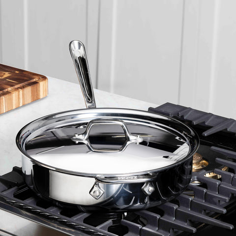 All-Clad D3 handle rivet detail emphasizing secure grip for confident sautéing.