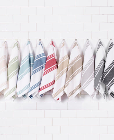 All-Clad towels with durable stitched hems for long-lasting use