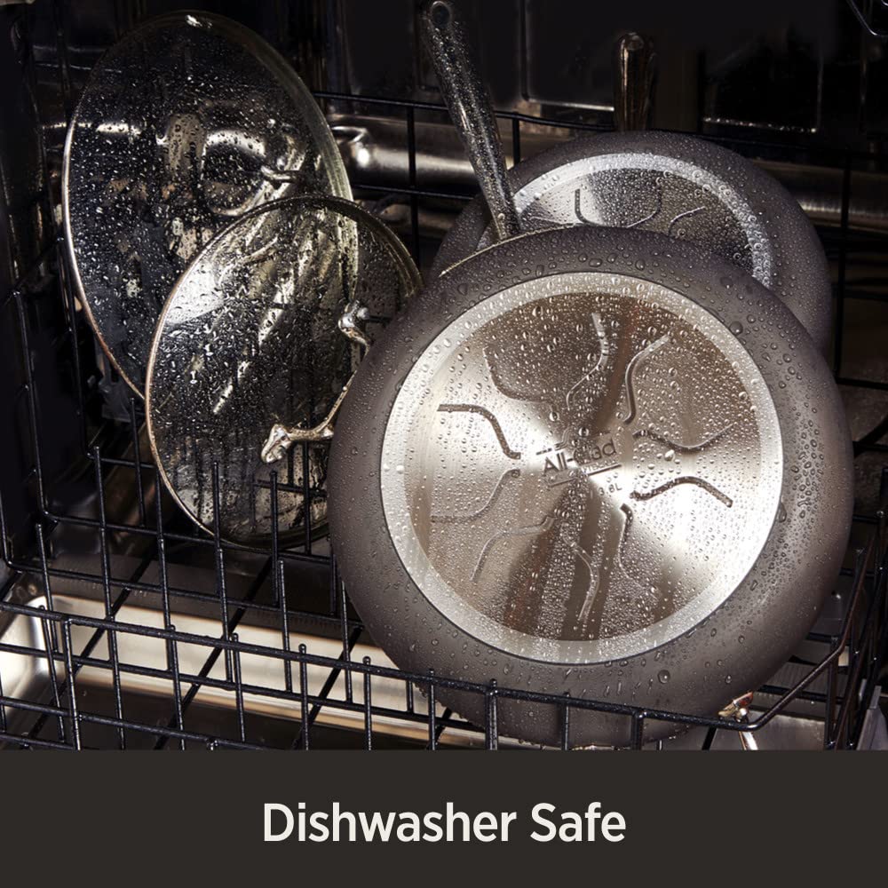 All-Clad HA1 hard-anodized construction delivers durable, even heating for roaster dishes.