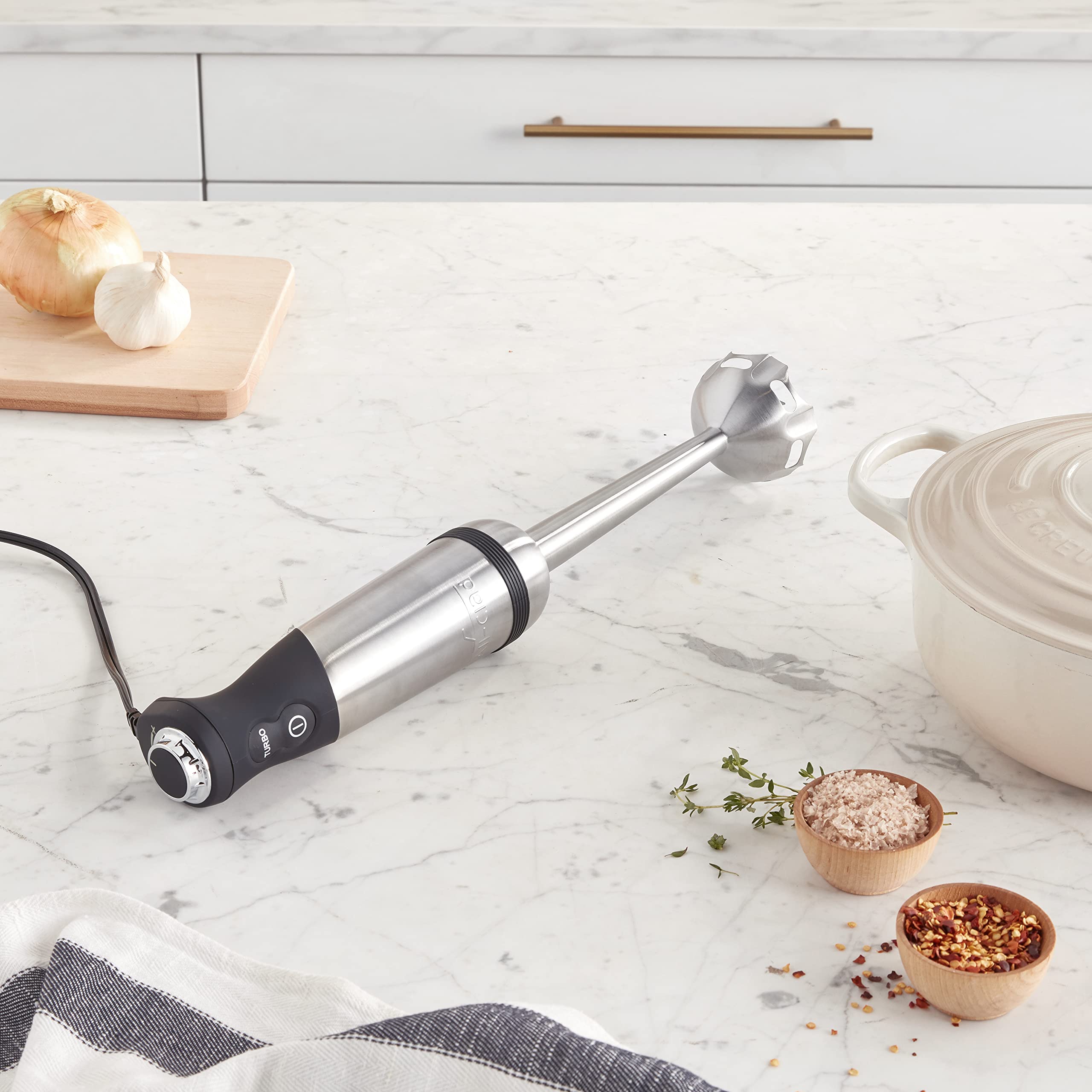 All-Clad immersion blender with variable-speed control for precise texture in sauces.
