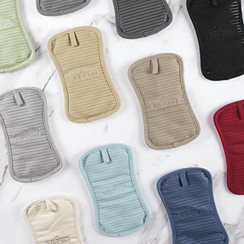 All-Clad versatile hot pad for kitchen and barbecue uses.