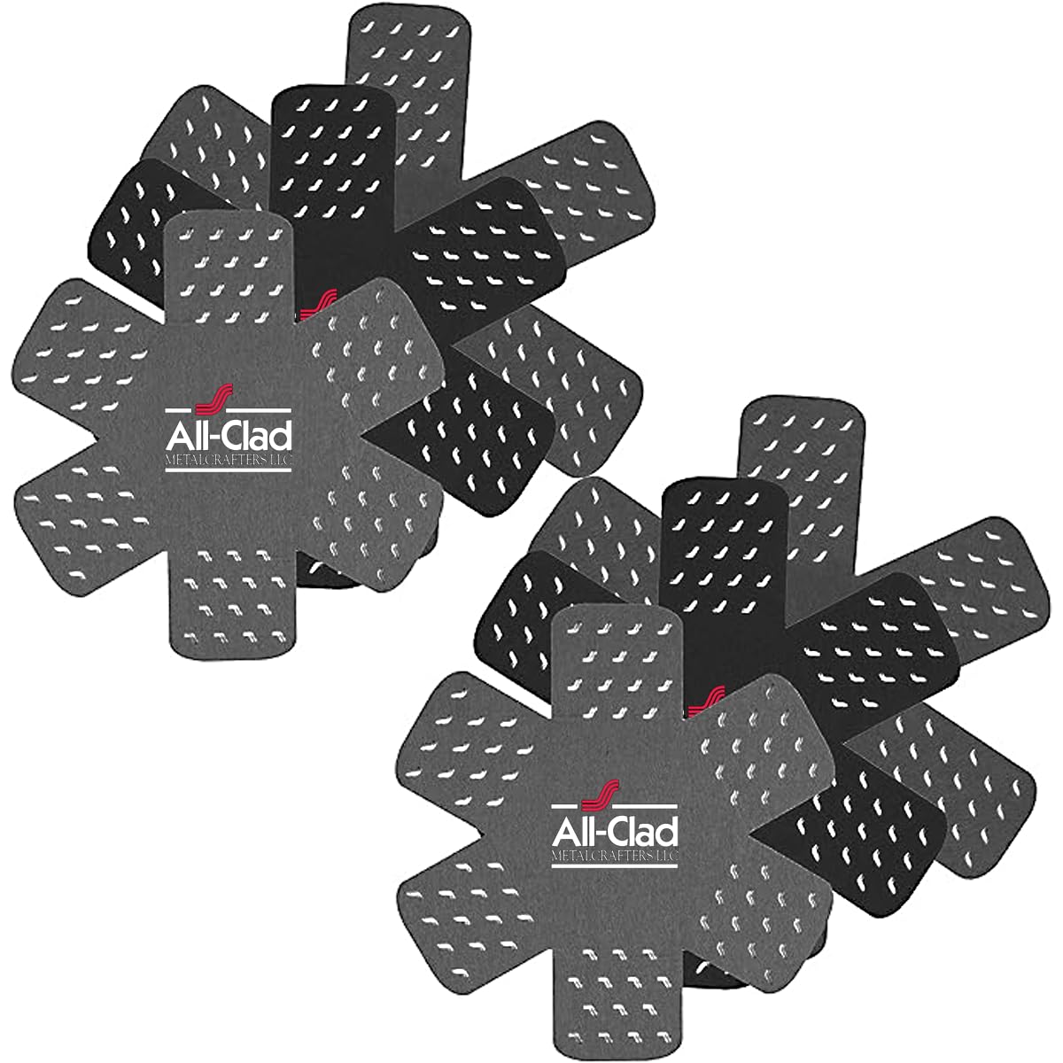 All-Clad pot protectors with star-pattern cover protecting cookware.