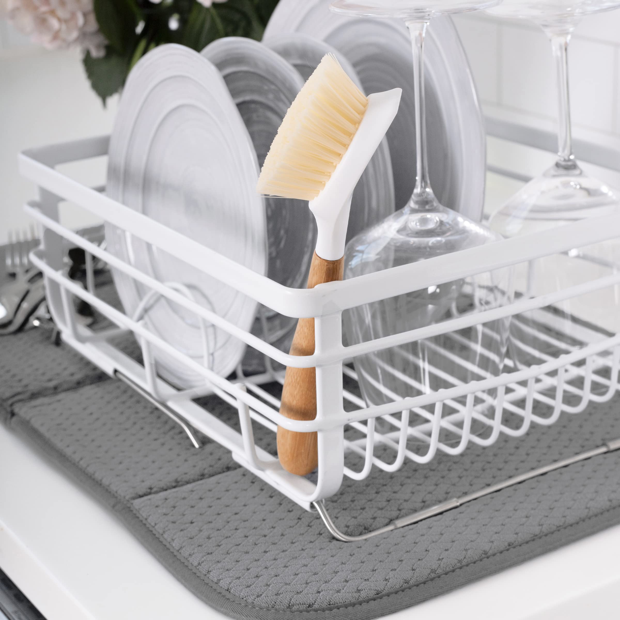 All-Clad dish drying mat folded for compact storage after use