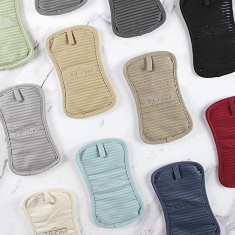 Indigo color adds a stylish touch to kitchen tasks with All-Clad pot holder.
